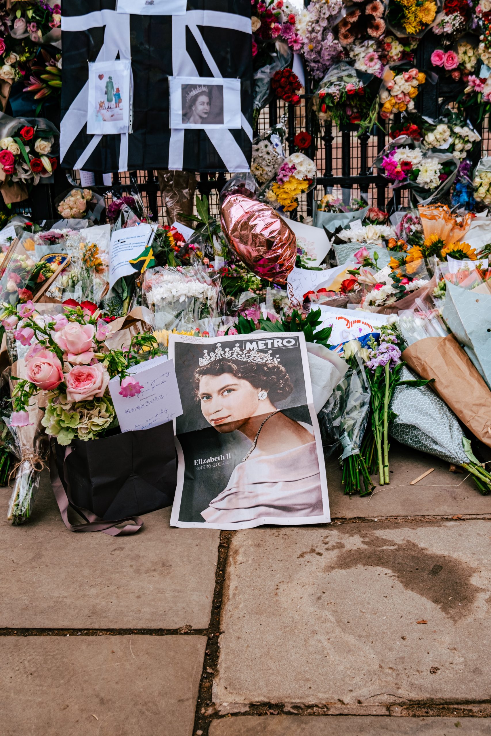 A photo of flowers and tributes to Queen Elizabeth II