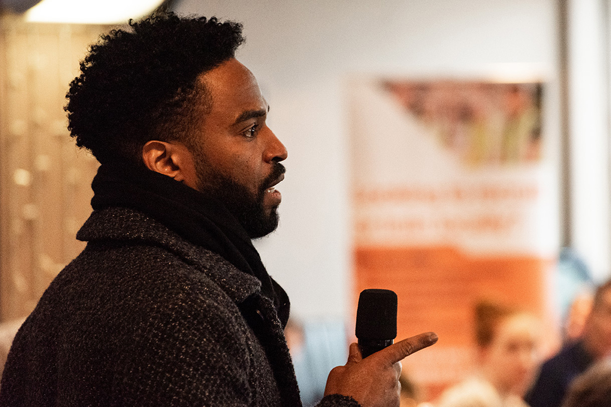 Man speaking at a networking event