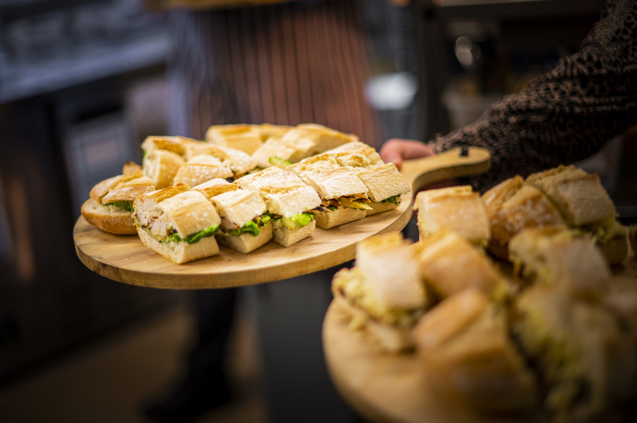 Freshly prepared sandwiches on boards